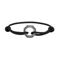Bracelet cordon noir avec ornement hexagone en acier inoxydable ajustable.