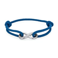 Bracelet cordon bleu marine avec ornement infini en métal argenté ajustable.