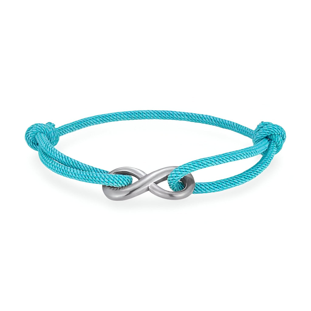 Bracelet cordon cyan avec ornement infini en métal argenté ajustable.