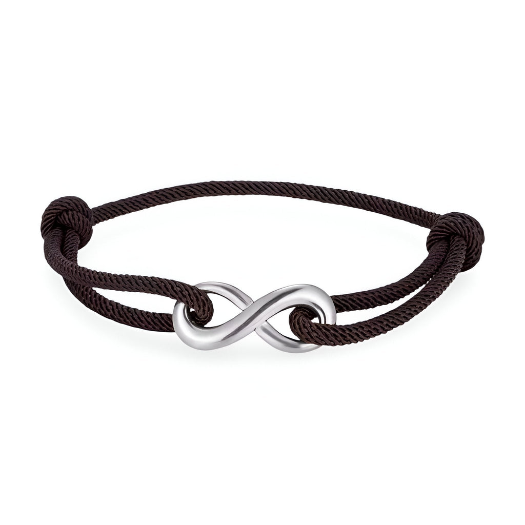 Bracelet cordon noir avec ornement infini en métal argenté et nœuds coulissants ajustables.