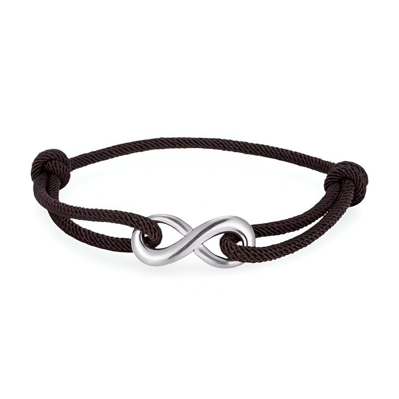Bracelet cordon noir avec ornement infini en métal argenté et nœuds coulissants ajustables.