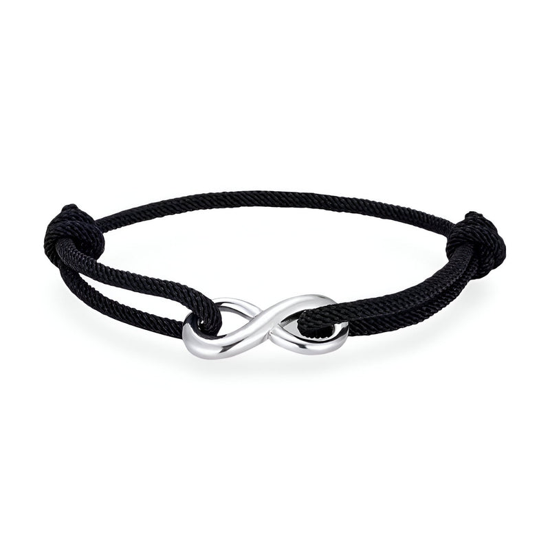 Bracelet cordon noir avec ornement infini en métal argenté, design ajustable élégant.