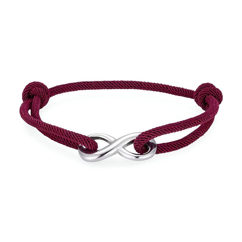 Bracelet cordon bordeaux avec ornement infini argenté et nœuds coulissants ajustables.