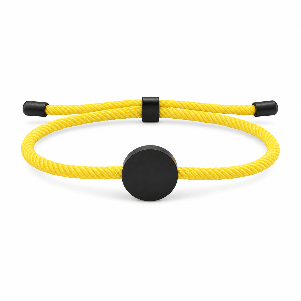Bracelet Dax Noir / Jaune, cordon ajustable et médaillon rond, posé de face sur fond blanc