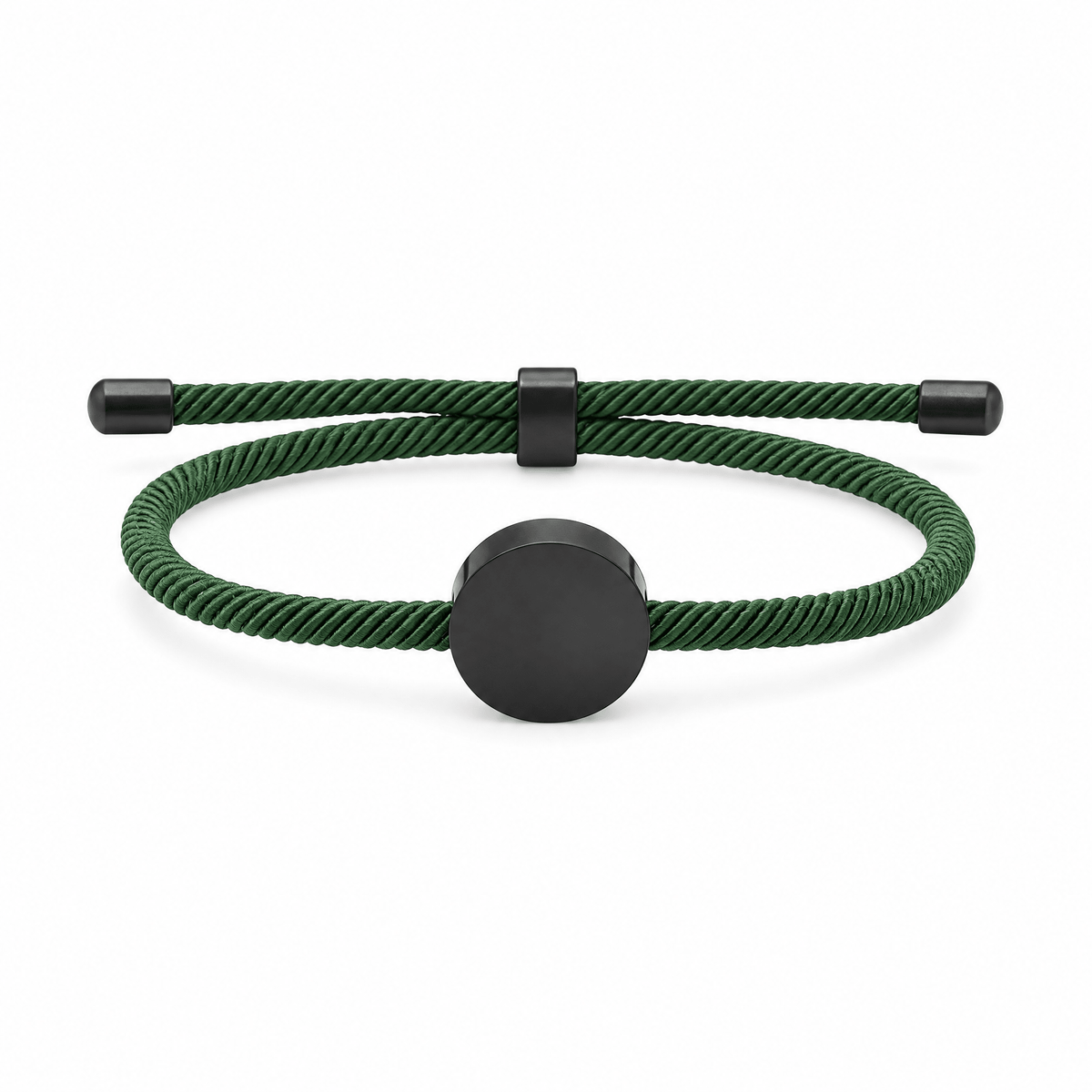 Bracelet Dax Noir / Vert, cordon ajustable et médaillon rond, posé de face sur fond blanc