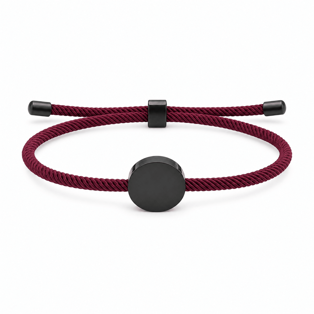 Bracelet Dax Noir / Bordeaux, cordon ajustable et médaillon rond, posé de face sur fond blanc