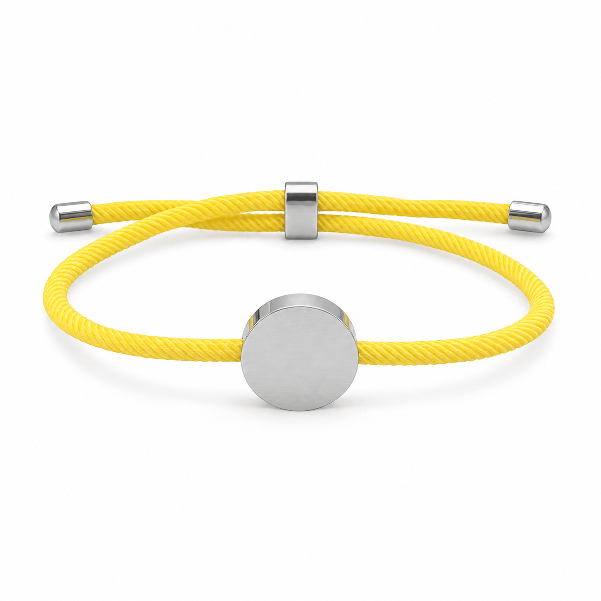 Bracelet Dax Argent / Jaune, cordon ajustable et médaillon rond, posé de face sur fond blanc
