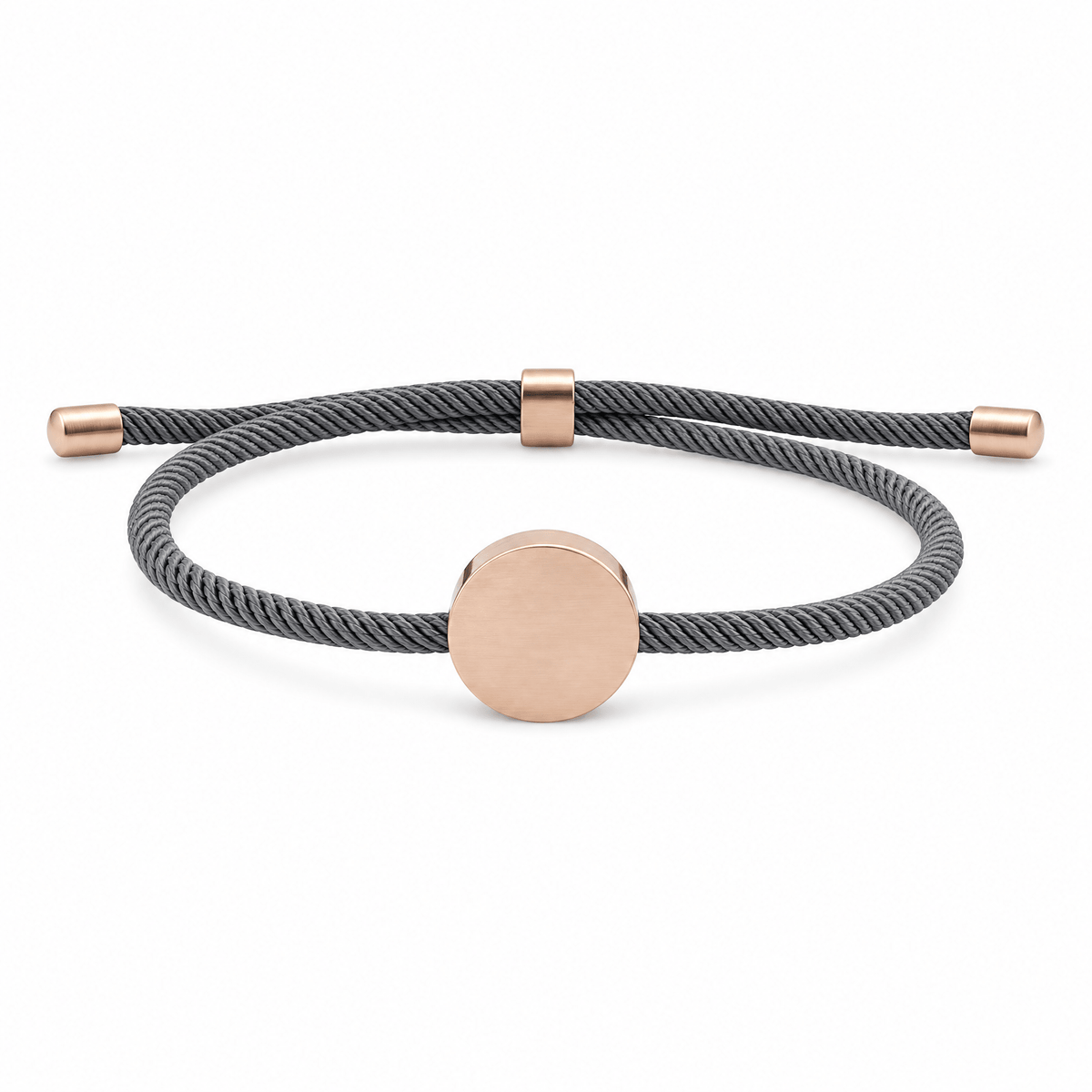 Bracelet Dax Or rosé / Gris, cordon ajustable et médaillon rond, posé de face sur fond blanc