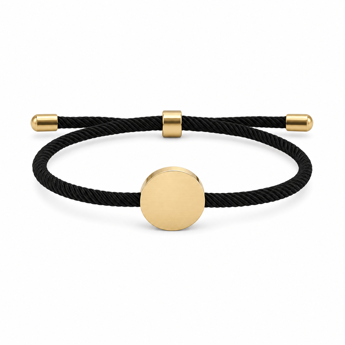 Bracelet Dax Or / Noir, cordon ajustable et médaillon rond, posé de face sur fond blanc