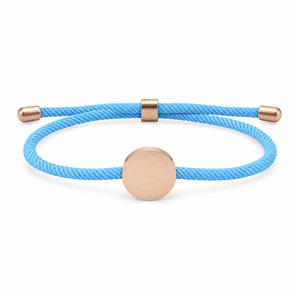 Bracelet Dax Or rosé / Bleu clair, cordon ajustable et médaillon rond, posé de face sur fond blanc