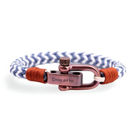 Bracelet cordon bleu et blanc à mousqueton ancien cuivre gravé "Crois en toi" avec détails marron.