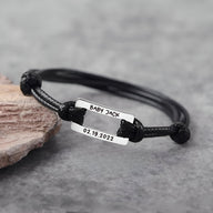 Bracelet cordon noir avec plaque acier inoxydable gravée personnalisée Baby Jack et date.
