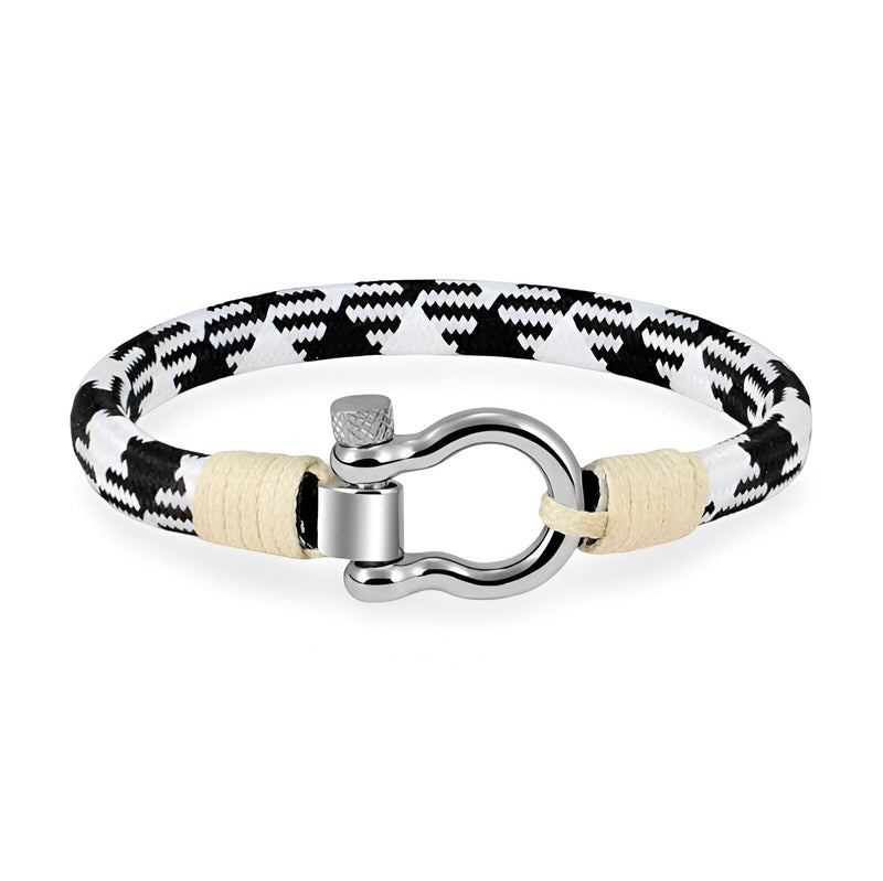 Bracelet cordon blanc et noir avec mousqueton arrondi en métal argenté et détails beige.