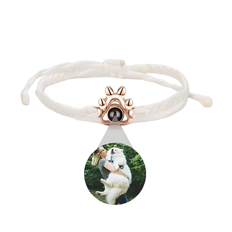 Bracelet corde blanc avec médaille photo ronde et patte de chien en argent rosé 925.