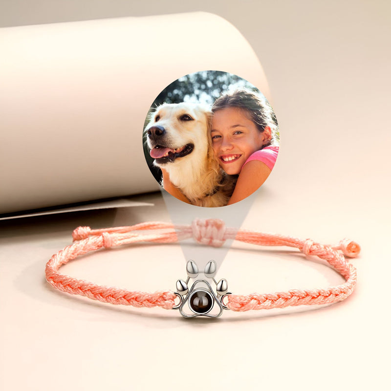 Bracelet corde rose avec pendentif patte de chien en argent 925 et photo personnalisée ronde.