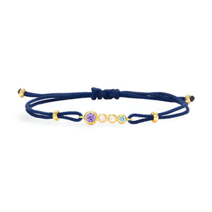 Bracelet cordon bleu marine avec argent sterling doré et trois zircons colorés rond adaptés aux femmes.