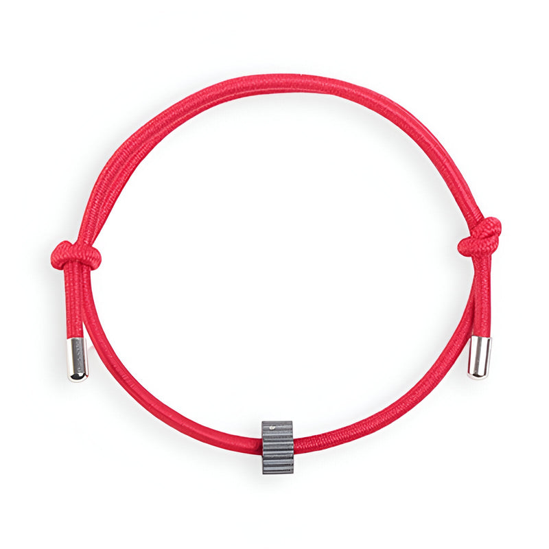 Bracelet cordon rouge avec ornement cylindrique en carbure de tungstène noir mat.