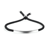 Bracelet cordon noir avec plaque gourmette en acier inoxydable argenté, modèle Lydie.