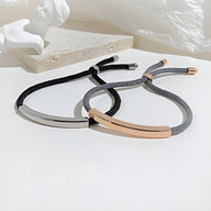 Bracelet cordon gourmette noir avec plaque en acier inoxydable argenté et fermoir coulissant noir et gris avec plaque en.