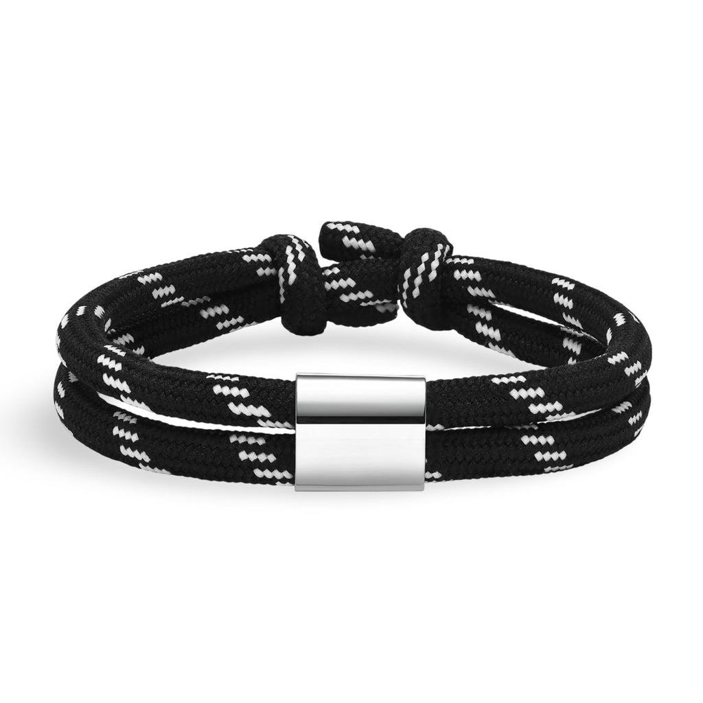 Bracelet cordon noir à rayures blanches avec fermoir métallique argenté pour homme.