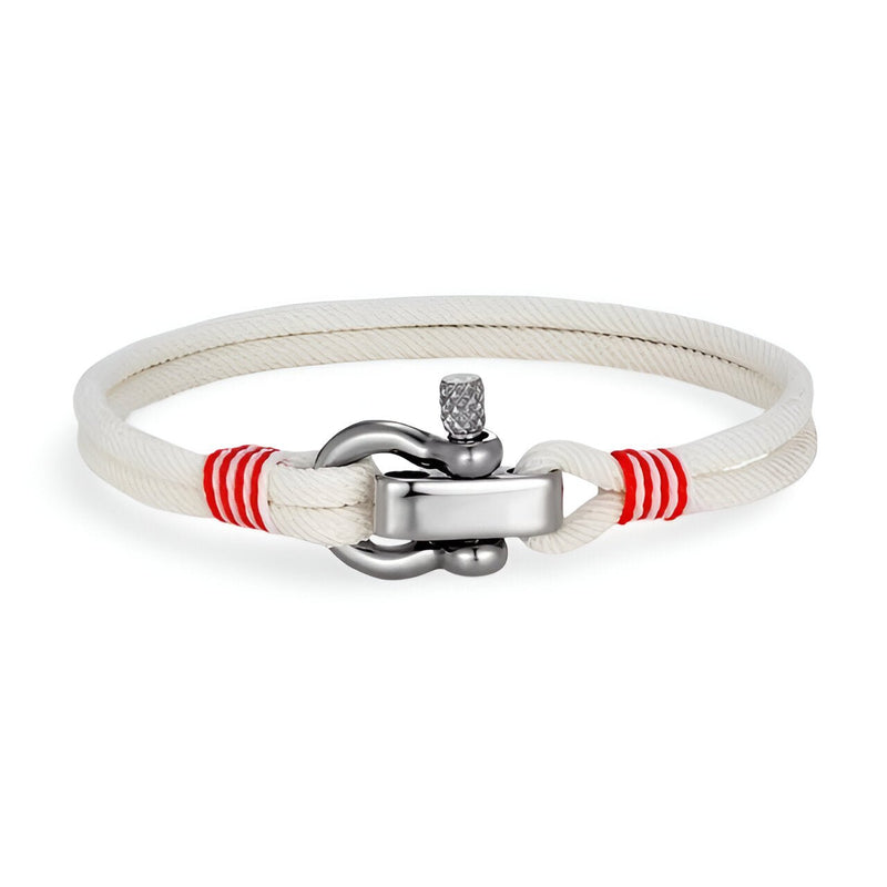 Bracelet cordon blanc avec manille en acier inoxydable et détails rouges sur les attaches.