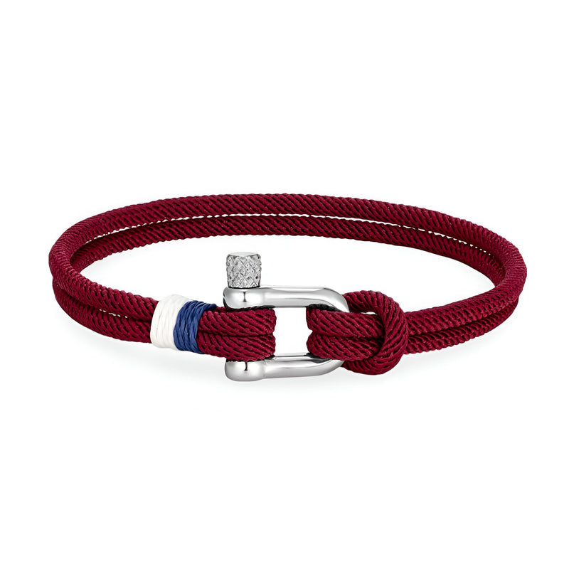 Bracelet cordon bordeaux avec manille en acier inoxydable et détail tricolore bleu blanc rouge.