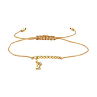 Bracelet cordon beige avec perles dorées et pendentif signe zodiaque Gémeaux ajustable.