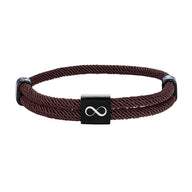 Bracelet cordon marron avec plaque acier inoxydable noire gravée d'un signe infini.