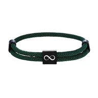 Bracelet cordon vert foncé ajustable avec plaque noire en acier inoxydable et symbole infini blanc.
