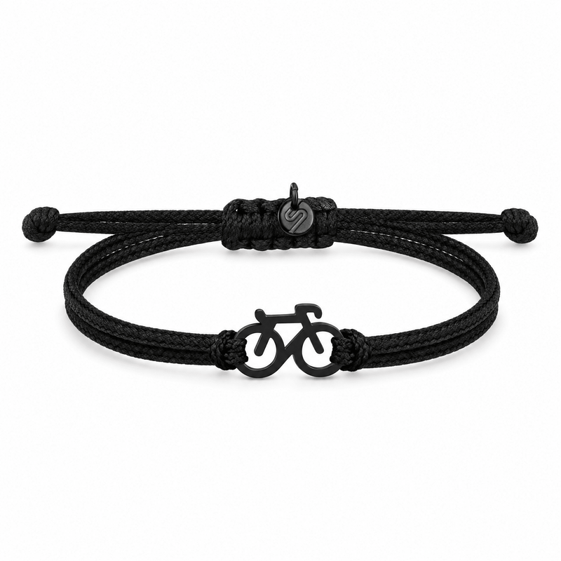 Bracelet Raymond Noir, charm vélo en acier inoxydable, posé de face sur fond blanc