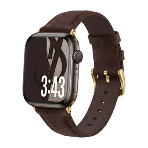 Bracelet en cuir marron foncé avec boucle dorée pour Apple Watch, style élégant et confortable.