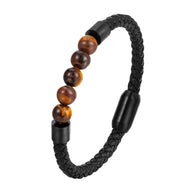 Bracelet homme en cuir noir tressé avec perles oeil de tigre et onyx, fermoir magnétique noir mat.