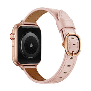 Bracelet Apple Watch en cuir pleine fleur rose pâle avec boucle ovale dorée élégante.