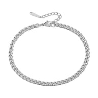 Bracelet de cheville en acier inoxydable argenté avec chaîne maille cubaine et fermoir mousqueton.