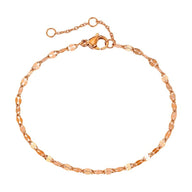 Bracelet de cheville or rosé en acier inoxydable, maille fine grain de café, fermoir mousqueton.