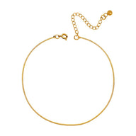 Bracelet de cheville fin en acier inoxydable doré avec chaîne serpent et fermoir ajustable.