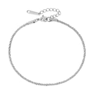 Bracelet de cheville en acier inoxydable argenté, maille spiga fine, fermoir ajustable, modèle Djani.