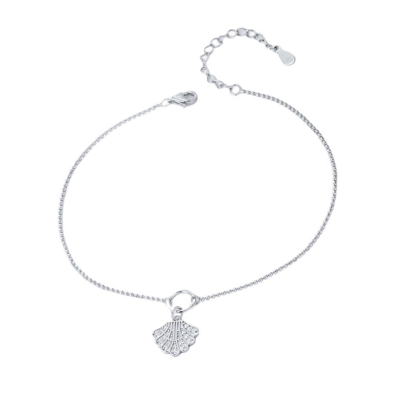Bracelet de cheville en argent sterling avec pendentif coquillage fin et chaîne délicate ajustable.