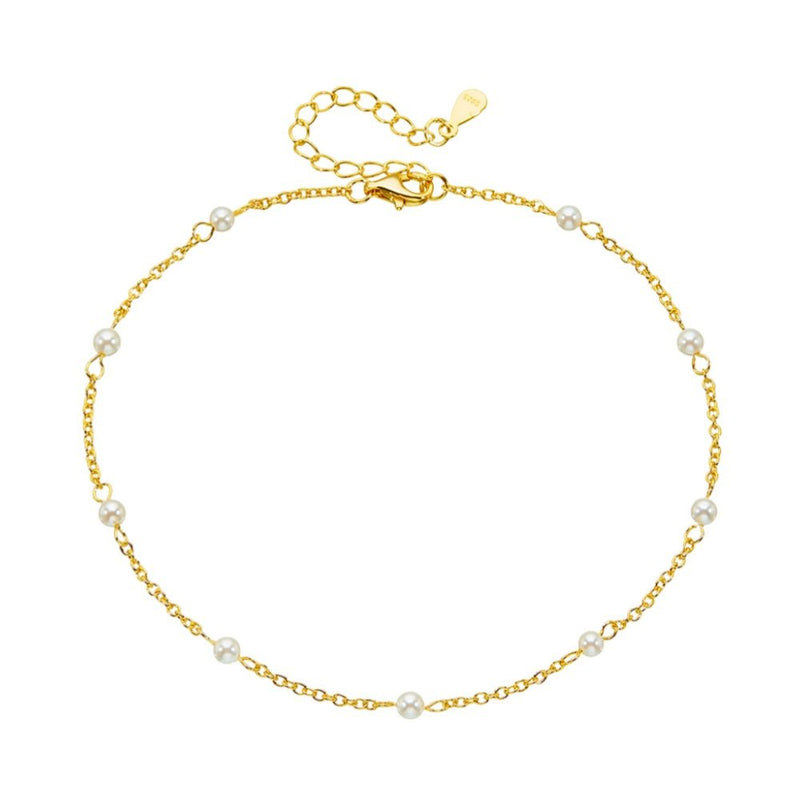 Bracelet de cheville fin en or avec petites perles d'eau douce élégantes et chaîne réglable.