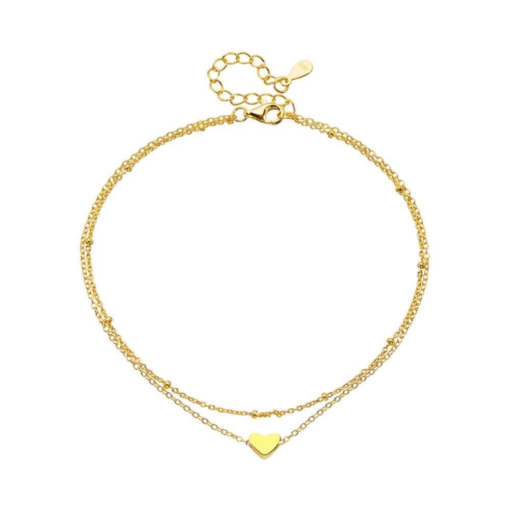 Bracelet de cheville doré en argent sterling avec petit pendentif cœur fin et chaîne fine double rang.