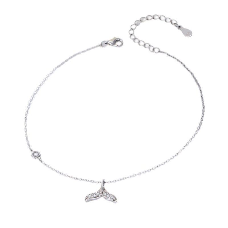 Bracelet de cheville fin en argent sterling avec pendentif queue de sirène délicate.