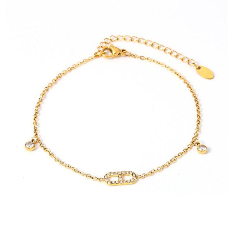 Bracelet de cheville or en titane avec zircons et chaîne fine élégante, modèle Valiane.