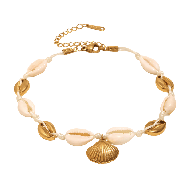 Bracelet de cheville or en acier inoxydable avec coquillages blancs et étoile de mer dorée centrale.