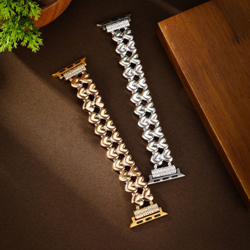 Bracelets Apple Watch doré et argenté à motifs cœurs pour femme, style élégant et féminin.