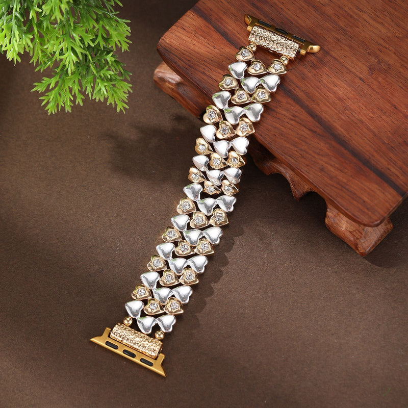 Bracelet Apple Watch or rosé avec motif cœurs brillants pour femme, style Jimena, maillons entrelacés.