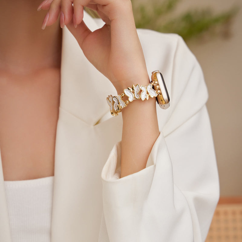 Bracelet Apple Watch doré à motif papillons blancs, élégant et féminin, modèle Florencia.