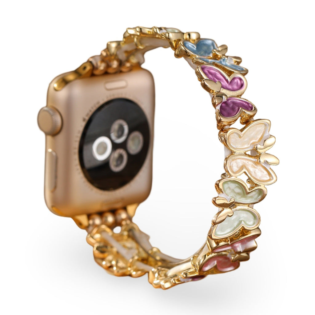 Bracelet Apple Watch doré avec motifs papillons multicolores en émail, modèle Florencia, pour femme.