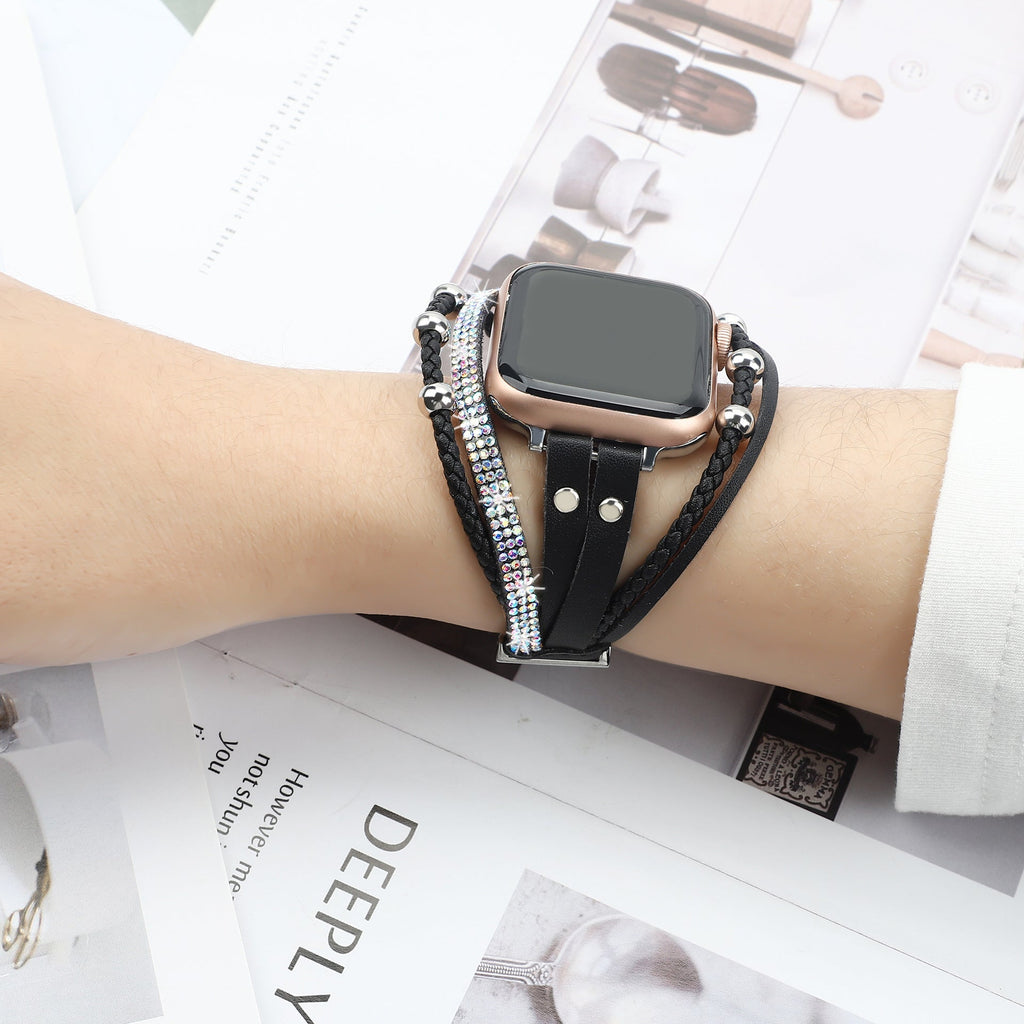 Bracelet Apple Watch noir à strass brillant, style double tour élégant pour femme.
