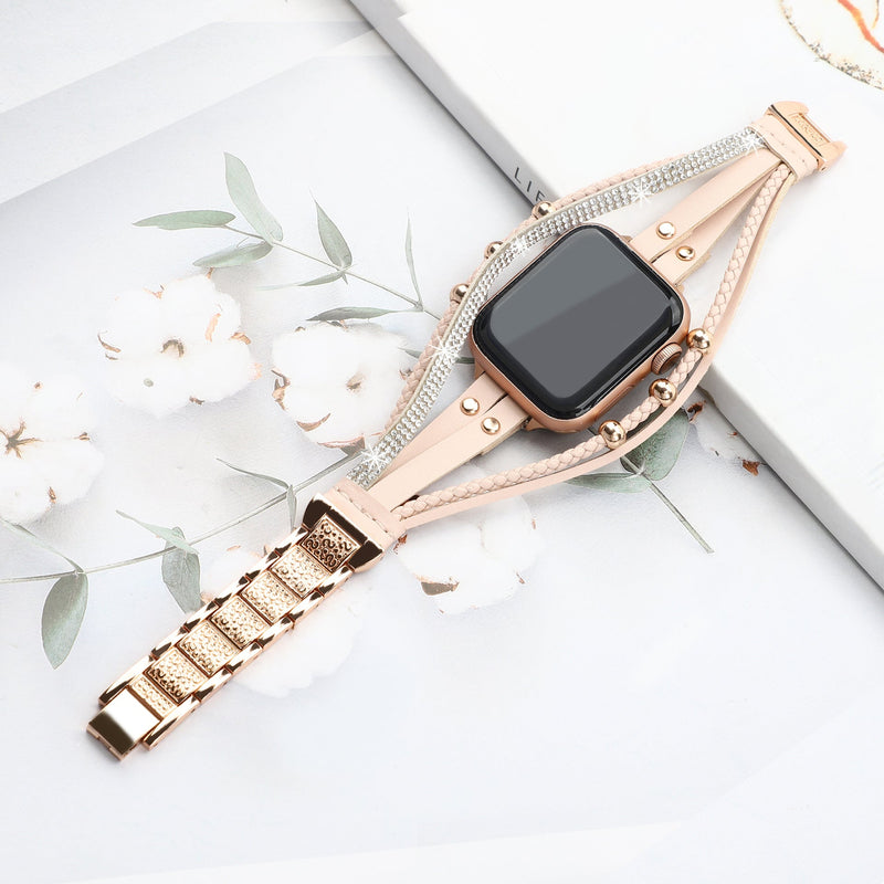 Bracelet Apple Watch rose à strass avec maillons métalliques, design élégant pour femme.