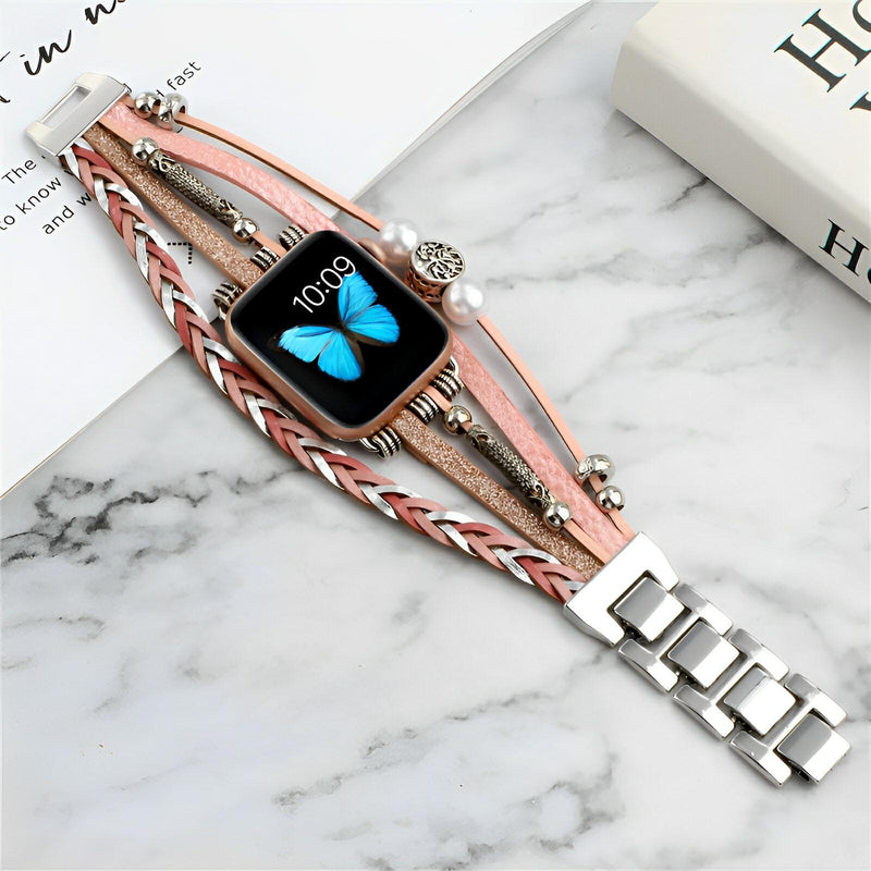 Bracelet Apple Watch rose avec motifs tressés et charms arbre de vie, modèle Ténecia.